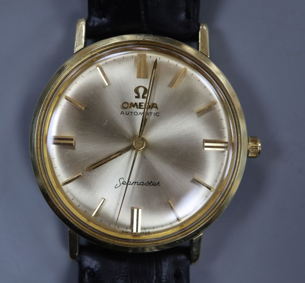 A gentlemans steel and gold plated Omega Seamaster Automatic wrist watch, on later associated leather strap.